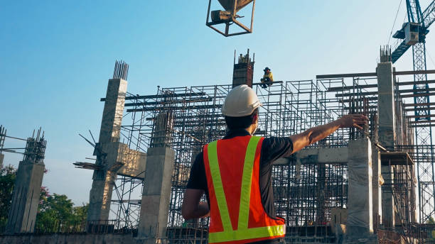 istock Asian engineer is delivering concrete pouring work at a construction site. 1757499610