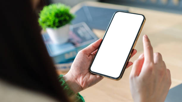 istock Human working on modern smartphone with blank white mobile screen for advertising, mockup, technology, advertising, search information, creative design, social media, online marketing, chat, phone 1757501350
