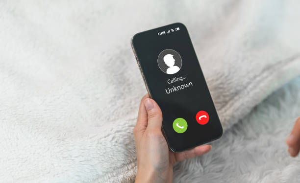 istock Human use smartphone with incoming call from unknown number, spam, prank caller, hoax person, fake identity, scammer, scam with mobile phone, hacker, call center, crime, call, fraud or phishing concept 1757501408