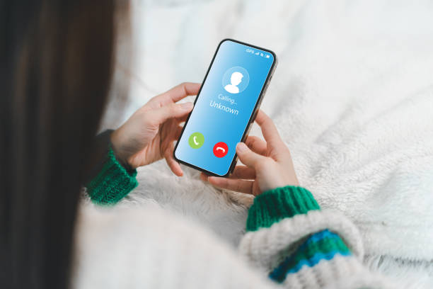 istock Human use smartphone with incoming call from unknown number, spam, prank caller, hoax person, fake identity, scammer, scam with mobile phone, hacker, call center, crime, call, fraud or phishing concept 1757501436