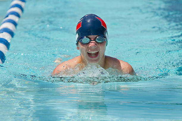 istock Boy Swimming Breast Stroke In Pool During Competitive Race 175750994