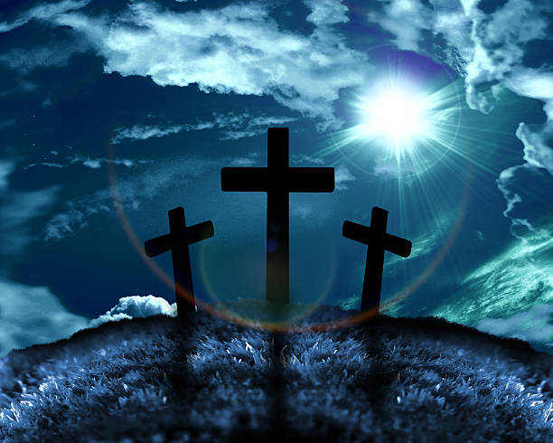istock Silhouette of three crosses on a hill 175751420