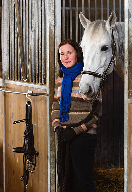 istock Woman and horse 175751536