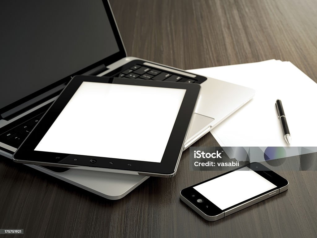 Office table 3D illustration of office table with electronic devices and blank sheet of paper Digital Tablet Stock Photo