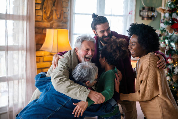 istock Cheerful extended multiethnic family having fun while celebrating Christmas together at home. 1757519493