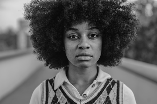 portrait of serious african american woman in black and white