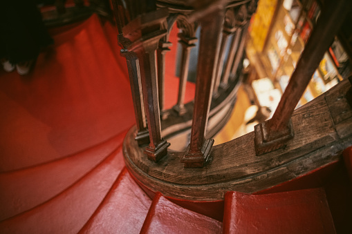 Grandiose wooden staircase with details in Porto's famous library called Lello