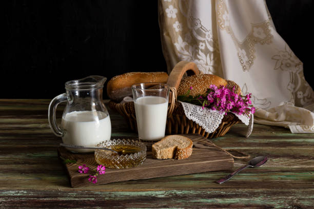 istock Milk, honey and bread on the table 1757531842