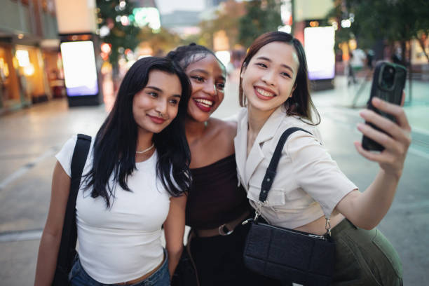 istock Friends taking selfies in the city 1757540651