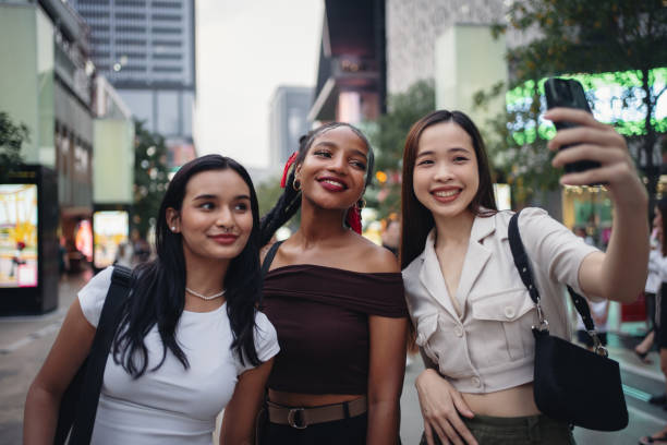 istock Friends taking selfies in the city 1757540655