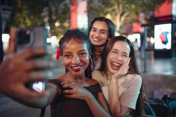 istock Friends taking selfies in the city 1757541786