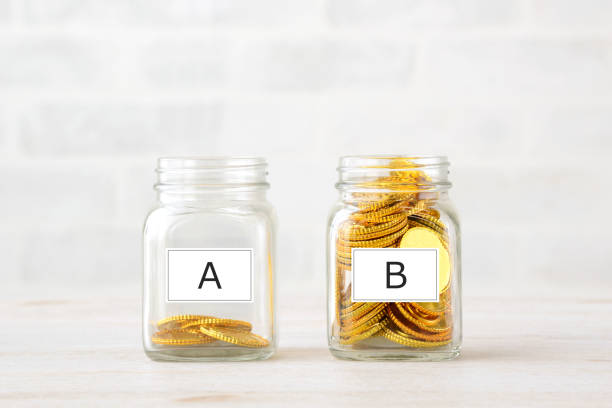 istock Coins filled in Bottles with alphabet word tag 1757544125