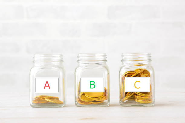 Coins filled in Bottles with alphabet word tag