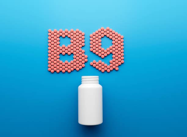 istock 3d Empty White Pill Bottle With B9 Text Made Of Rounded Vitamin B9 Tablets 3d Illustration 1757564791
