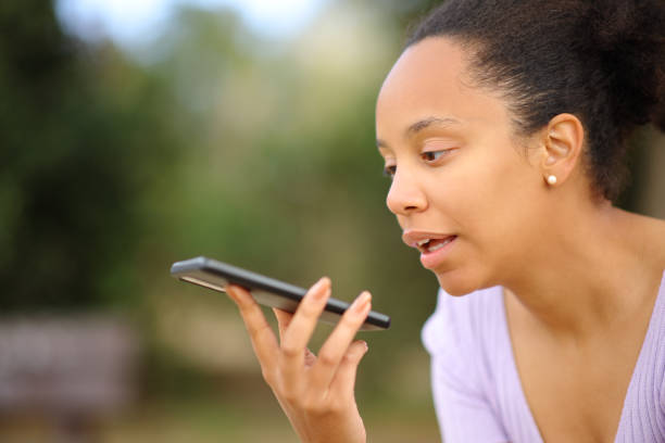 istock Black woman dictating message on phone 1757568921