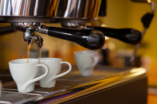 Espresso machine making a cup of coffee