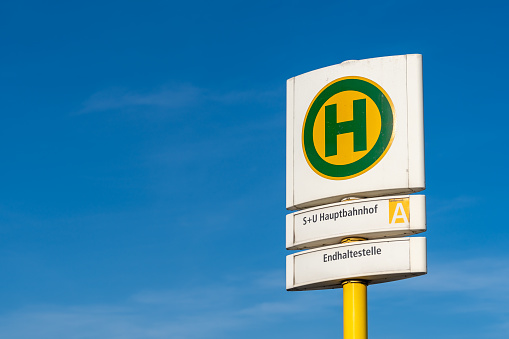 Germany, Berlin, October 18, 2023 - Close up of Busstop sign against clear sky, Berlin Marzahn