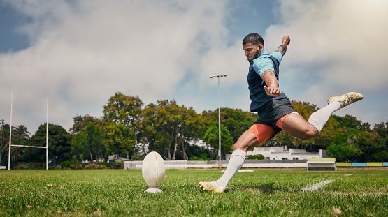 Rugby player performing penalty kick