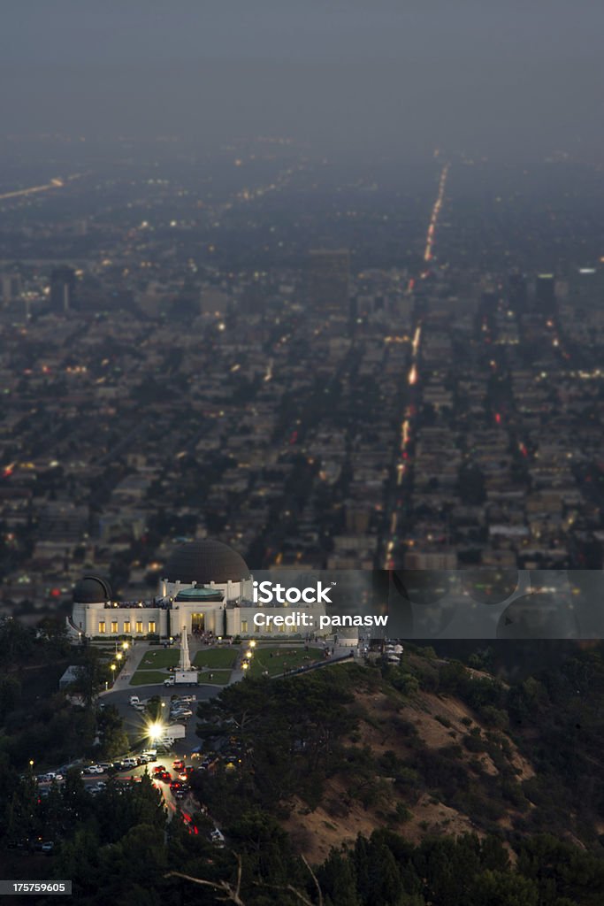 Griffith Observatory and the City View of the Griffith Park Observatory and Los Angeles from Mount Hollywood at dusk. Night Stock Photo