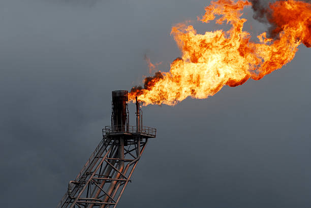 istock Flare boom nozzle and fire on offshore oil rig 175762090