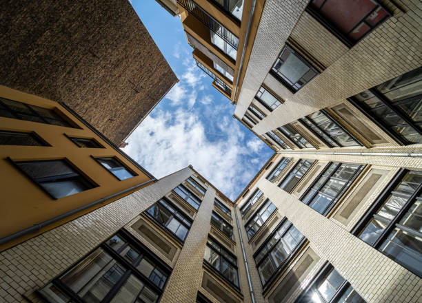 istock Low angle view of residential building against cloudy sky 1757621425