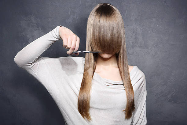 Girl with scissors Lovely girl decided to get a haircut bangs hair stock pictures, royalty-free photos & images