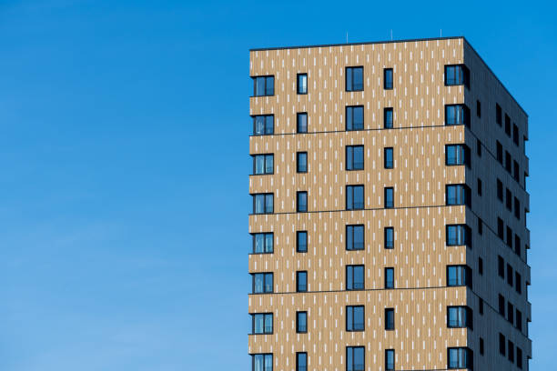 istock Low angle view of modern apartment building against clear sky 1757621976