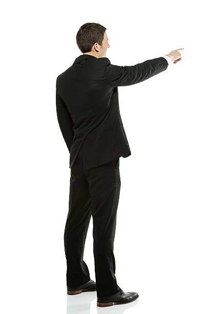 istock Rear view of a businessman pointing 175763101