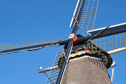 The head of the 19th century Vrouwbuurstermolen. It is a thatched flour mill east of the village Vrouwenparochie in Friesland The Netherlands. Image with copy space