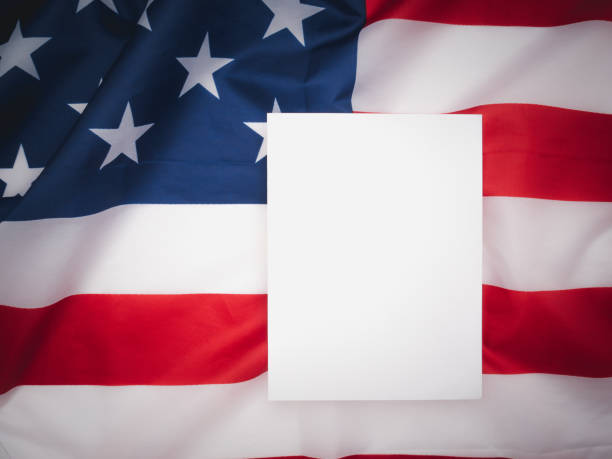 istock A blank white paper over the American flag background 1757644052