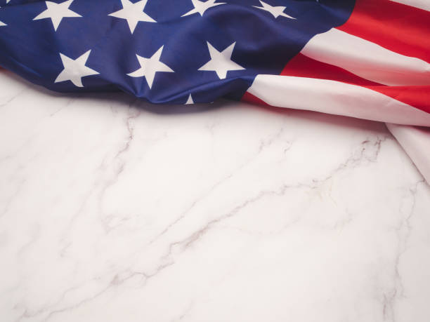 istock Part of the American flag is on a marble table 1757644599