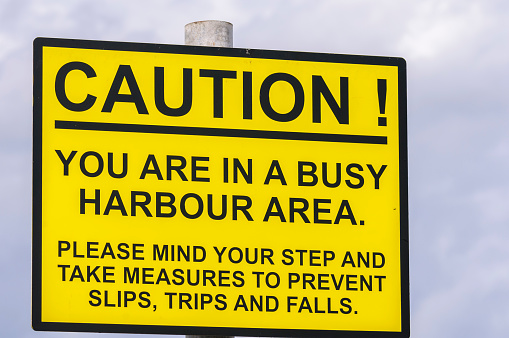 A sign warning people about trip hazards