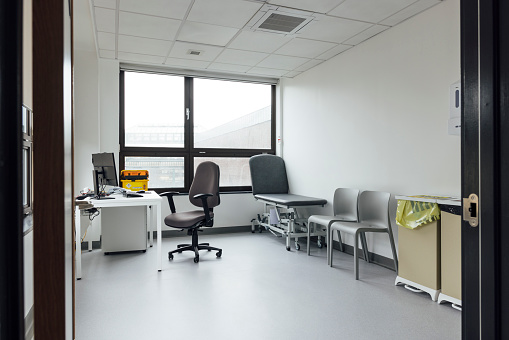 Wide view of an empty doctors office in a hospital in Newcastle, England.