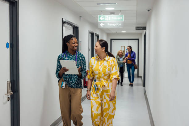 istock Healthcare Professionals Walking in Corridor 1757650583
