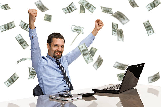 istock businessman with money rain 175765405