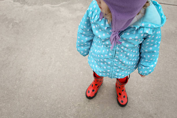 istock Little girl with red boots 175766085