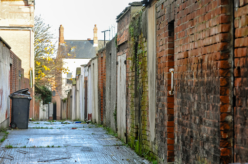 Entry (alleyway) to the rear of a row of terraced houses in an inner-city area