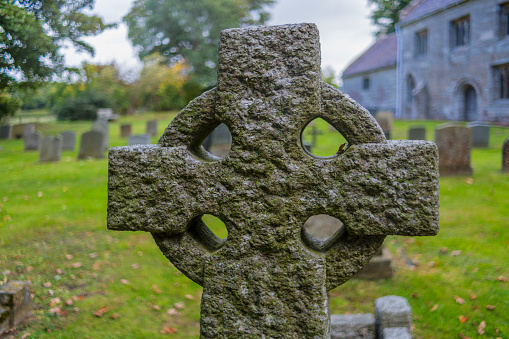 Trinity Church, Manhattan, New York, USA - March, 2024. Sign beside the Richard Churcher gravestone in Trinity Church cemetery in the heart of the Wall Street Financial district of Manhattan.