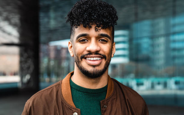 istock Happy young Latin man smiling in front of camera 1757671683