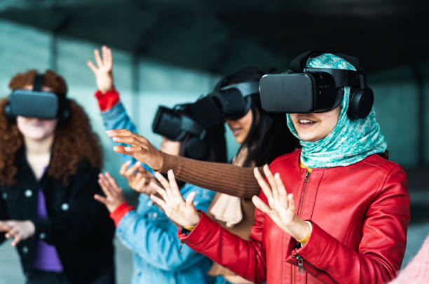 istock Young multiracial girls using  futuristic virtual reality glasses - Technology and metaverse concept 1757671834