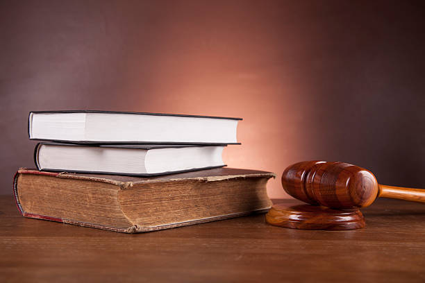 istock Law concept with wooden table and dark background 175767609