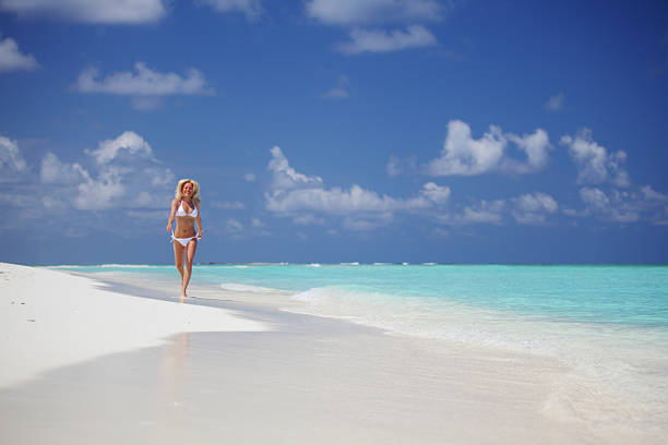 istock happy tropical girl run 175770667