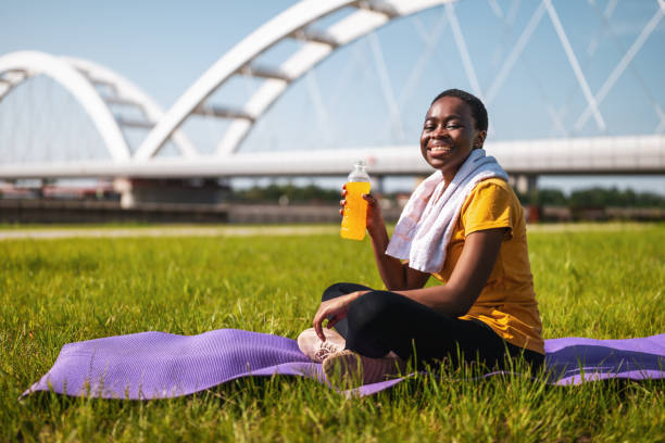 istock Sporty woman drinking  energy drink  after exercise 1757727650