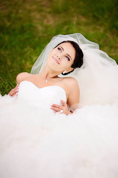 istock portrait of young brunette bride 175773256
