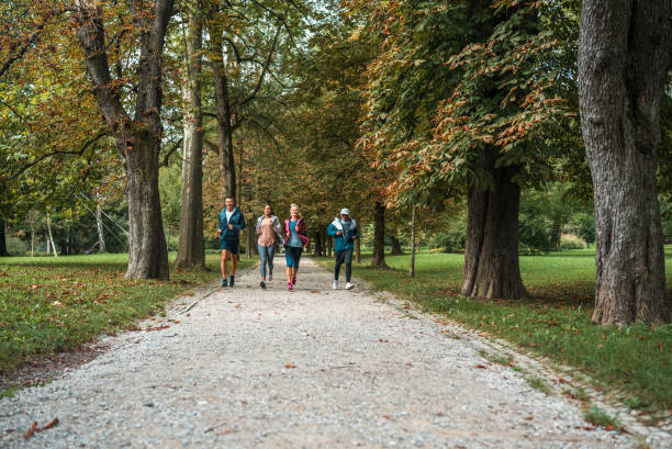 istock Diverse Adults Running in a Public Park 1757747452