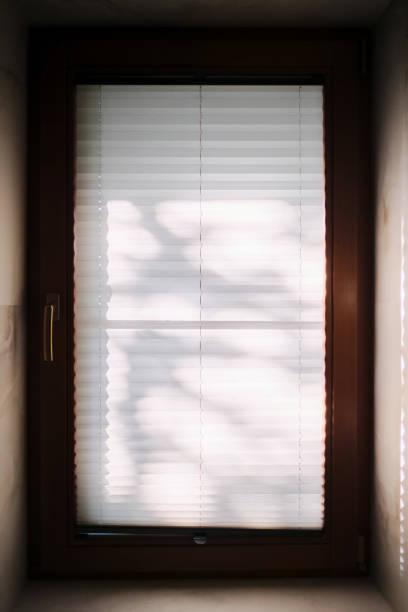 istock Sun glare on a pleated white curtain. 1757753430