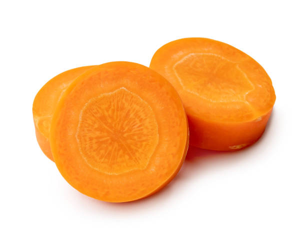 istock Beautiful orange  carrot slices in stack isolated on white background with clipping path 1757774800