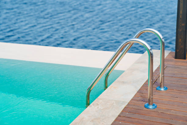 istock Terrace with swimming pool by the river. 1757775901