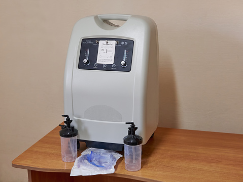 Portable oxygen concentrator for supplying oxygen to a sick person. Medical devices for combating symptoms of coronavirus disease (COVID-19)