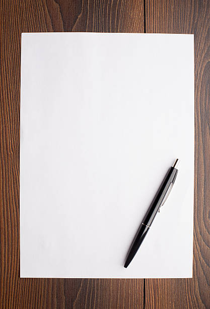 istock Blank sheet of white paper and pen 175778874